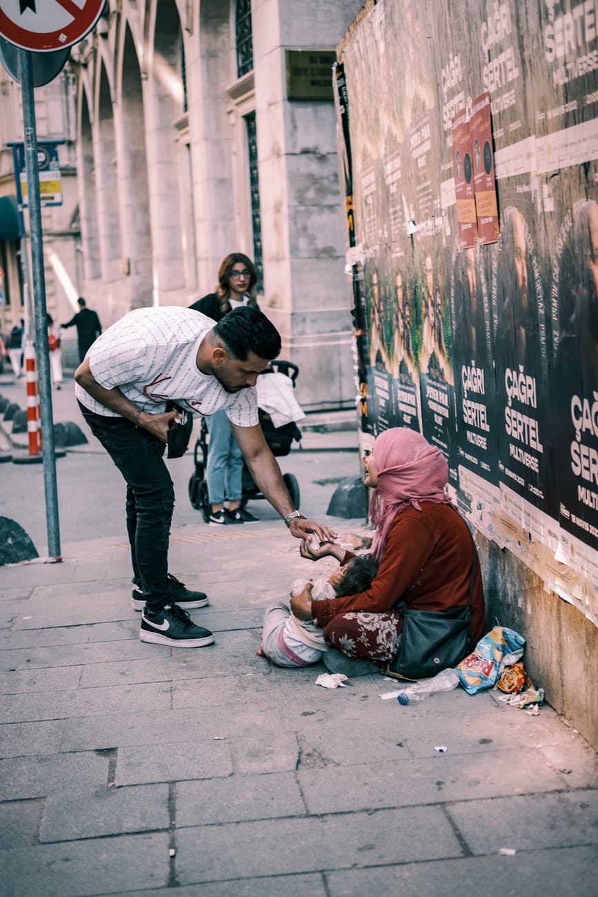 Person helping a homeless